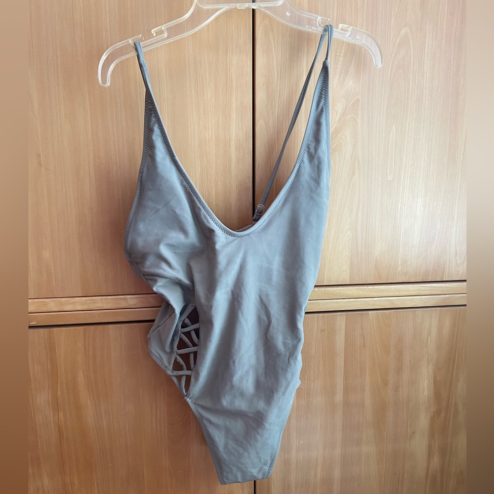 Green one piece bathing suit